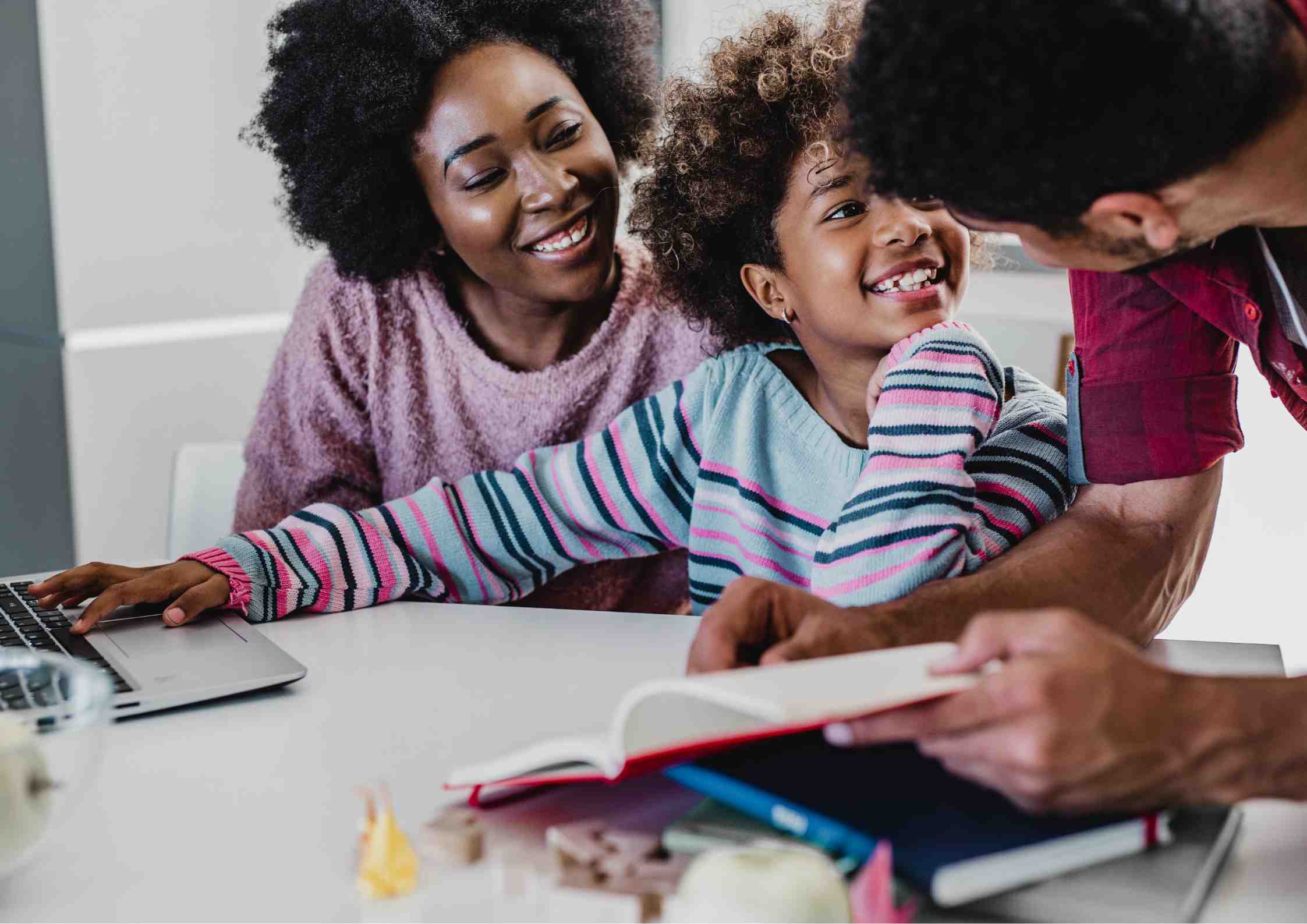 parents with child: parent getting child to listen by getting on the same eye level