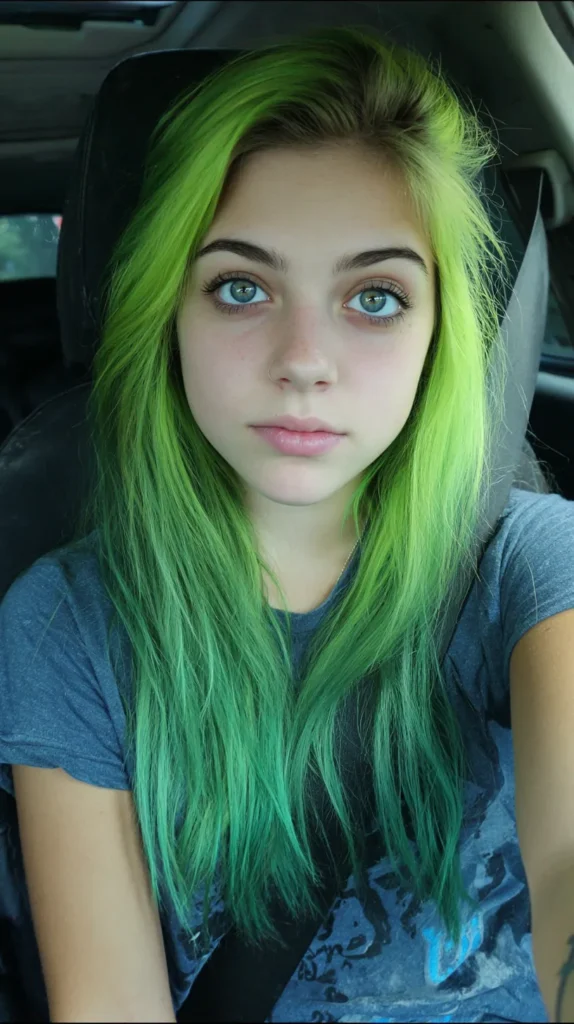 a teenage girl sitting in a car